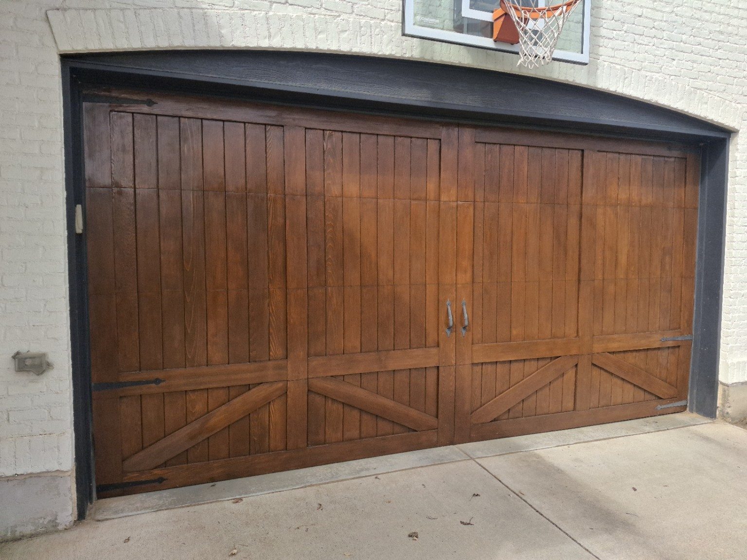 Wood Garage Door Restoration in Highlands Ranch, CO completed by DES Limited