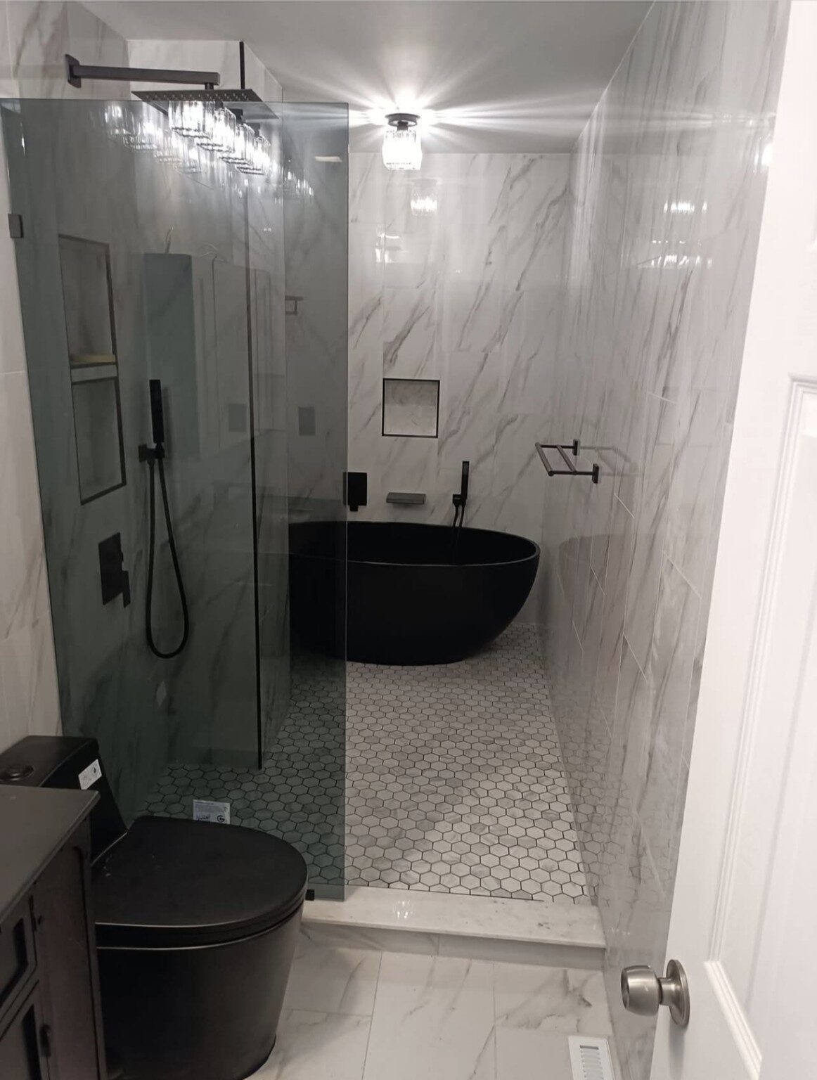 Bathroom tile and interior finish project in Lakewood, CO completed by DES Limited